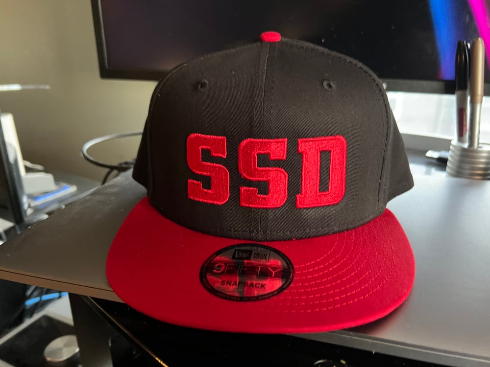 Black & Red New Era Flat Bill SnapBack Solid Red SSD Logo hat