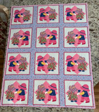 Image 1 of Girl and Boy panel quilt pink trim