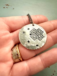 Image 15 of blue sapphire pendant with Fitzgerald quote