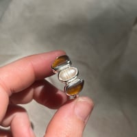 Image 1 of PEARL/AMBER SCORCH RING (P)