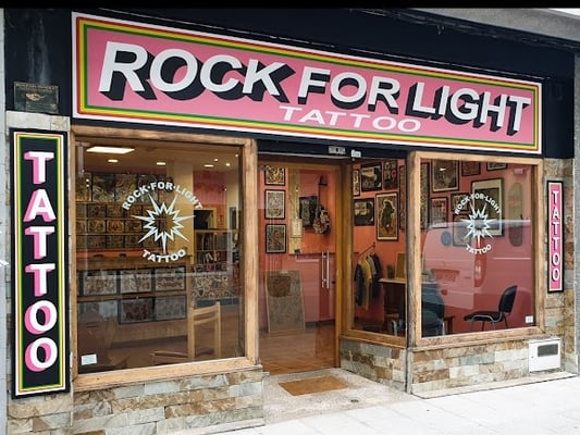Rock for light tattoo Home