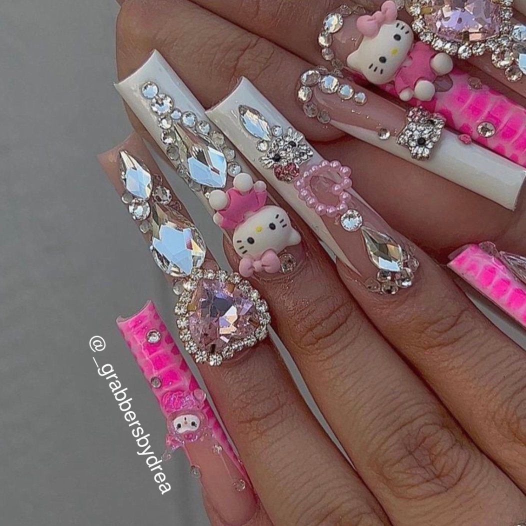 𝐂𝐇𝐀𝐑𝐌𝐒 𝐅𝐎𝐑 𝐍𝐀𝐈𝐋𝐒 💖 on Instagram: Junk nails>>😻  @nailssbysashh using Hello Kitty charm, Pink Kuromi, Bling HK charm, Silver  Star, and Pink Cross Charms to complete this gorgeous set 🎀💖 • use